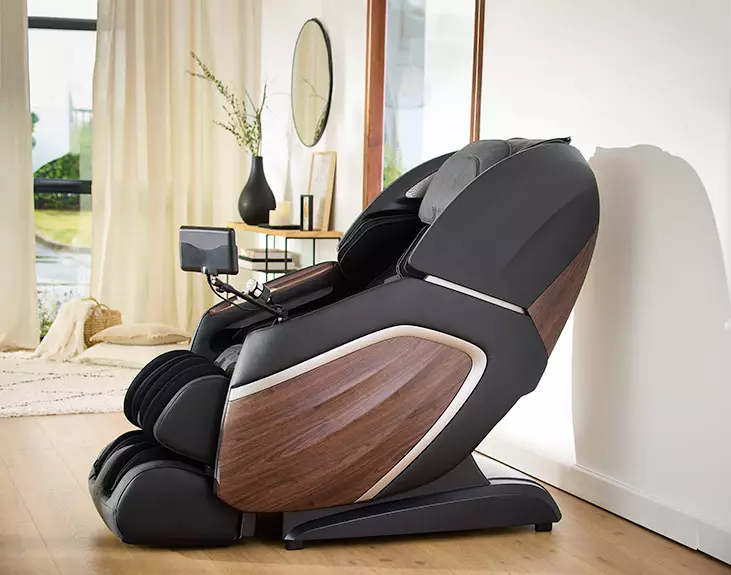 fauteuil de massage Helexia conte un mur